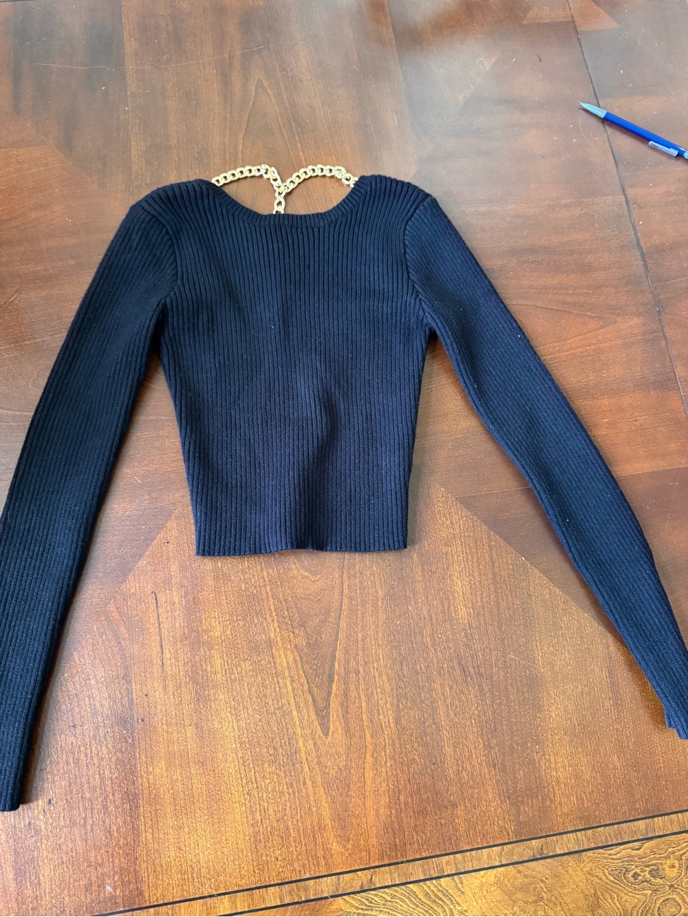 Black Ribbed Long-Sleeve Crop Top with Gold Chain Detail